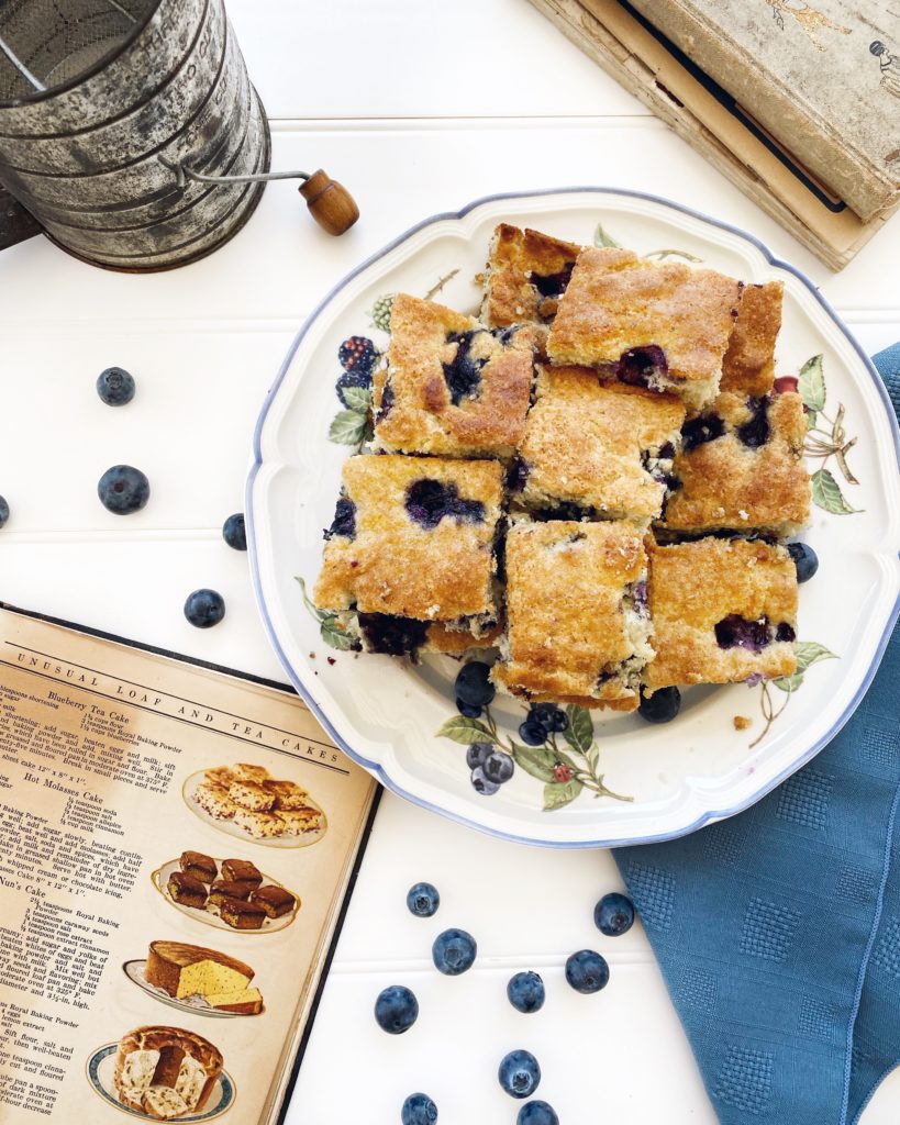 Blueberry Tea Cake with Vintage Cookbook in scene