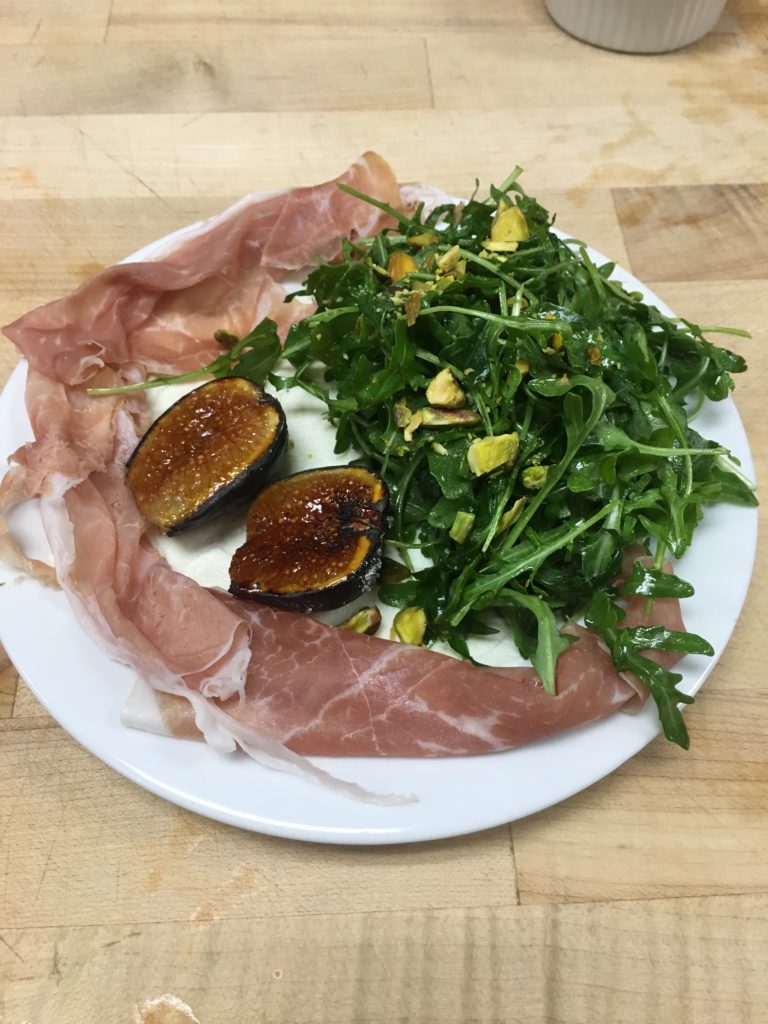 Arugula salad with figs, prosciutto, pistachio, mascarpone