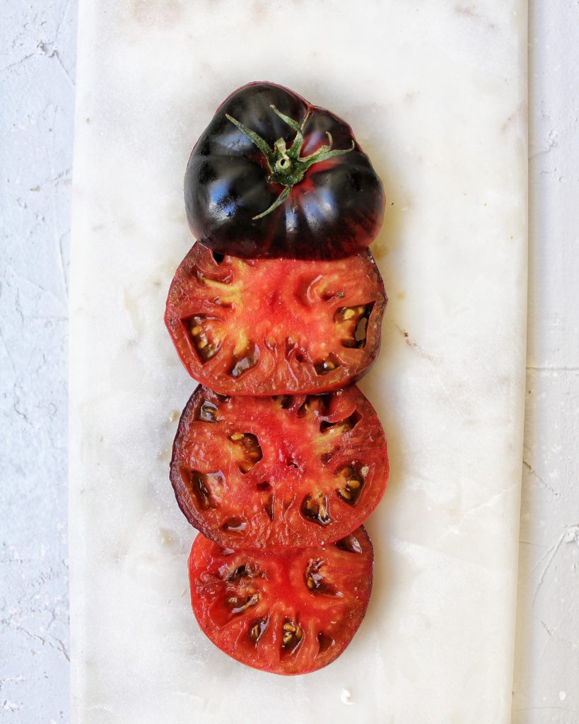 Black beauty tomato sliced