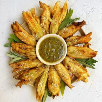 Fried zucchini blossom with sage walnut pesto