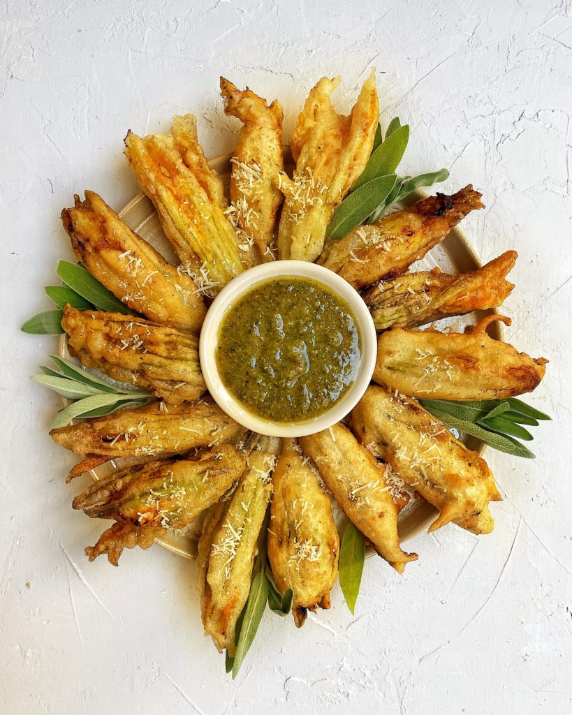 Fried zucchini blossom with sage walnut pesto