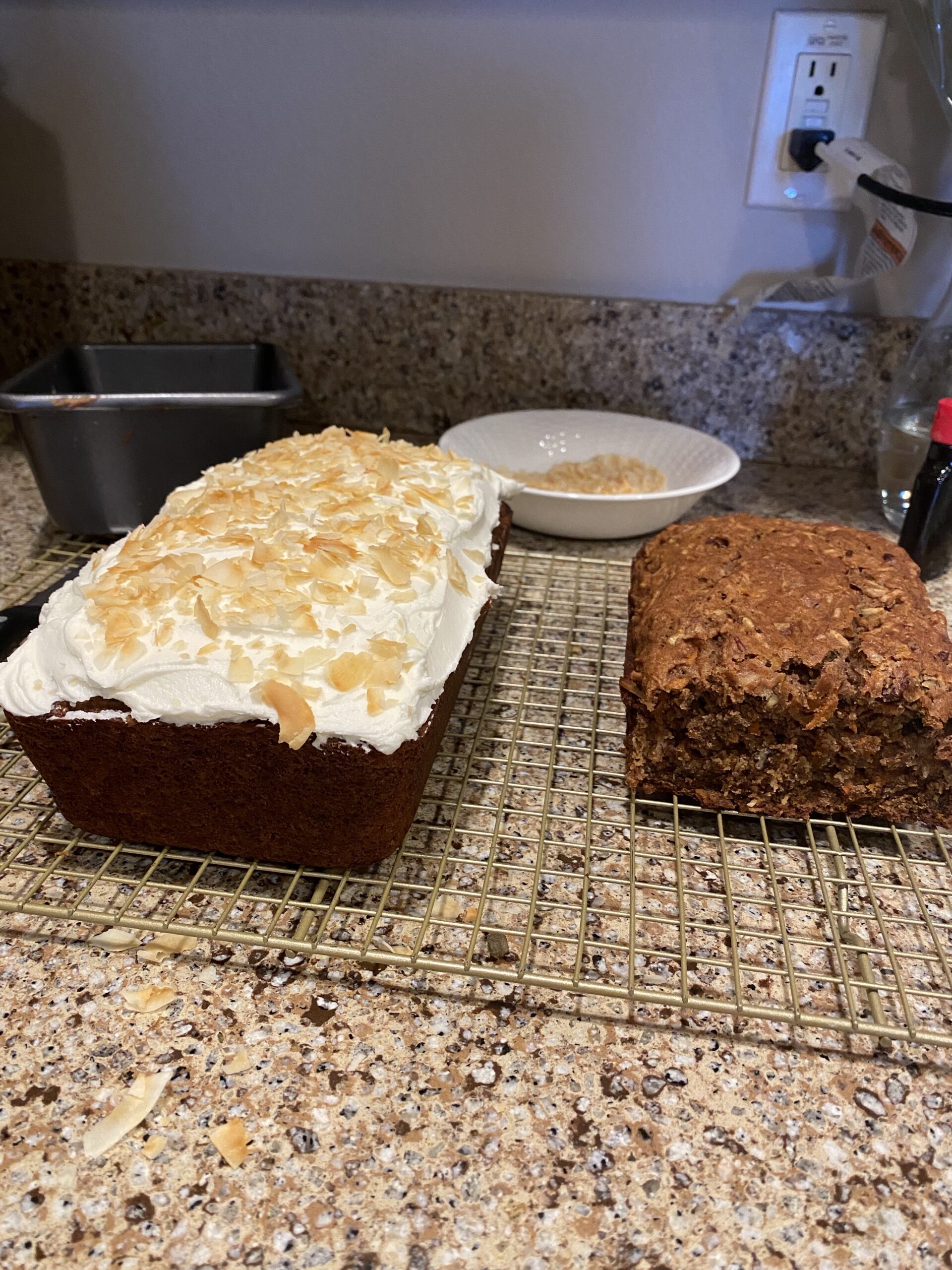 A side by side of 1 loaf made without yogurt and 1 loaf made with yogurt. 